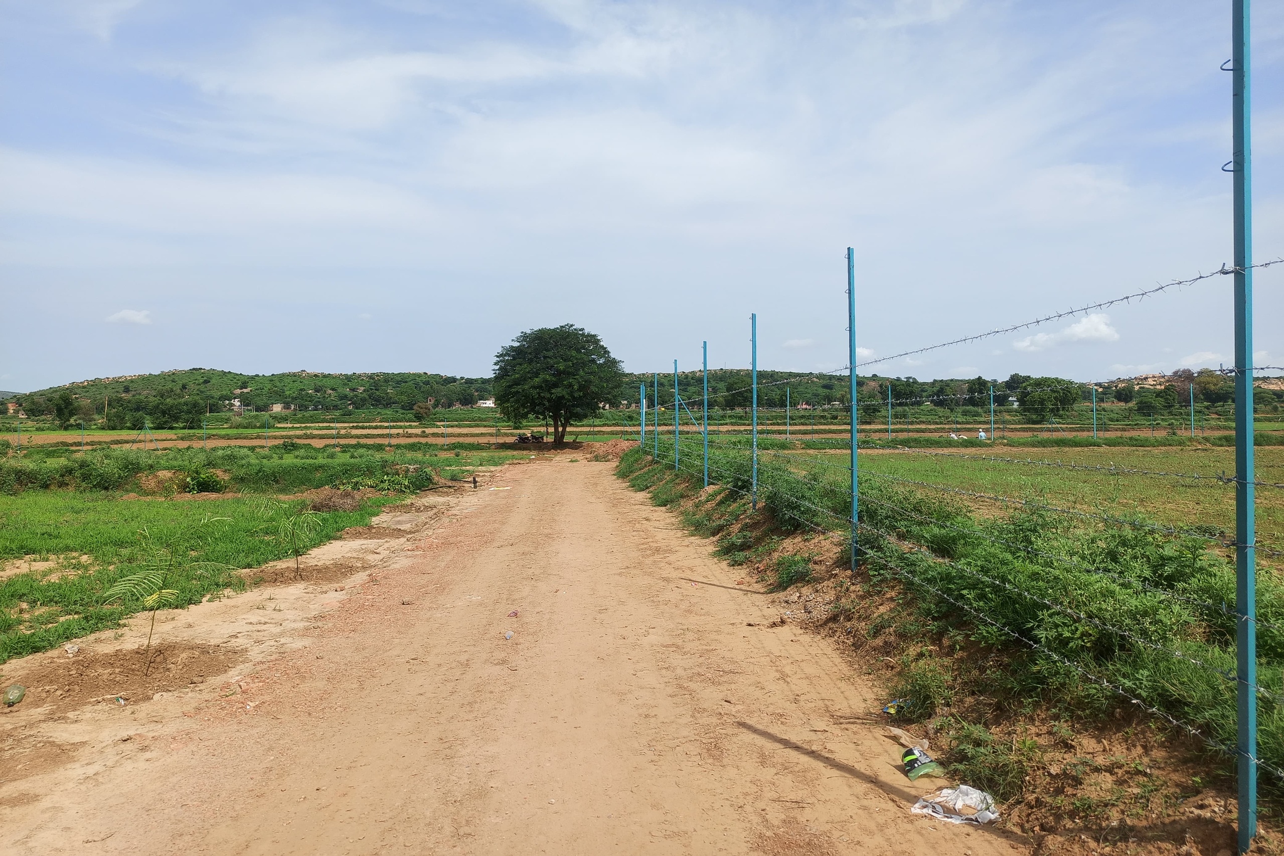 luxury-farmhouse-plots-at-vyom-chhatarpur-farms-alwar-with-scenic-aravalli-hill-views